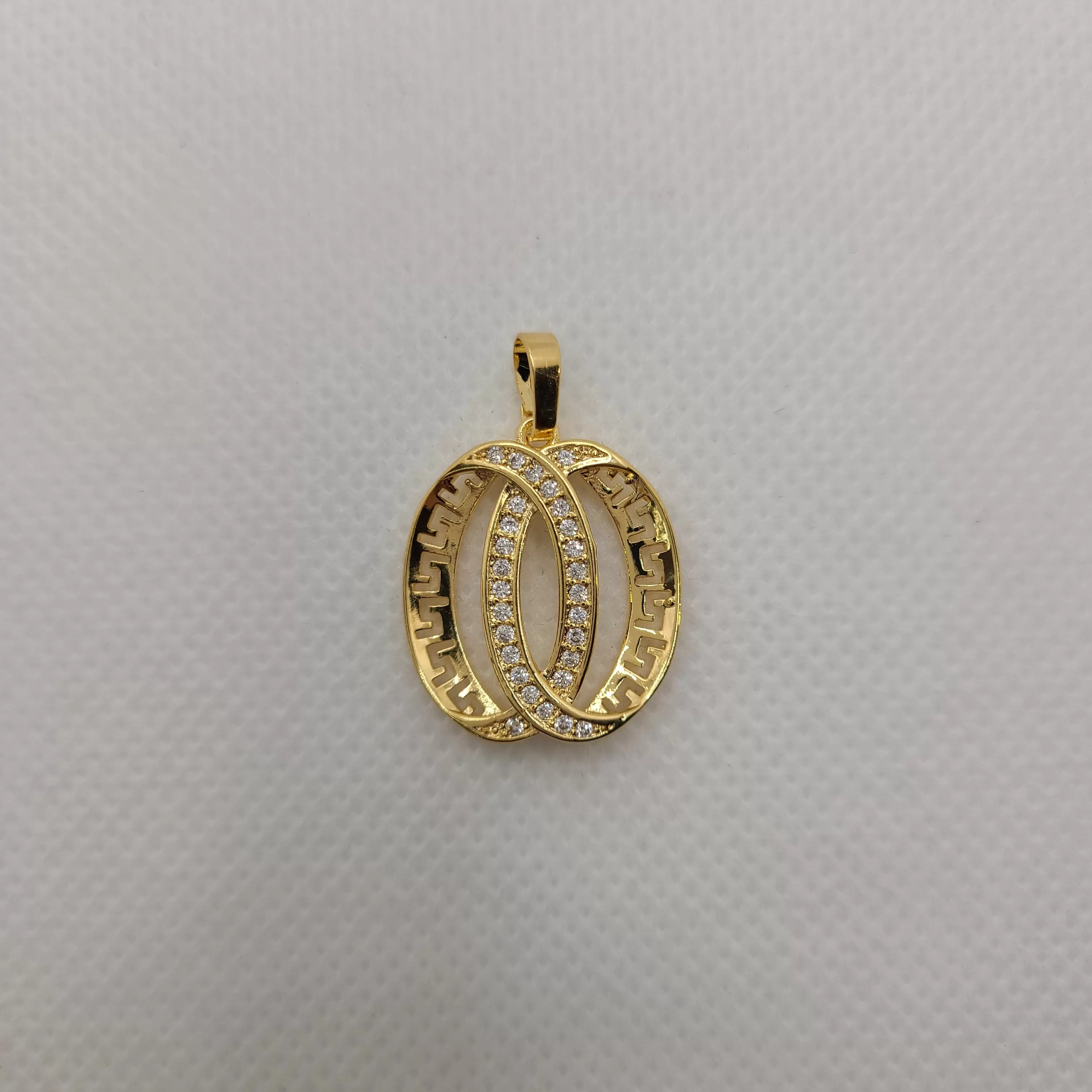 Gold pated versace design pendants