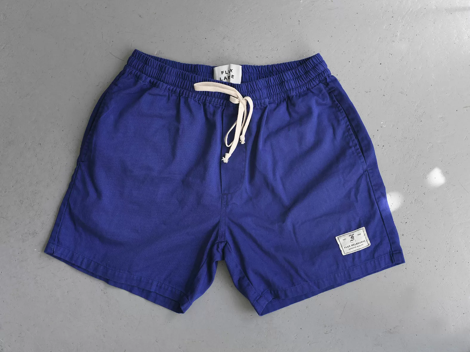 HIT THE CITY SHORTS. MARINE BLUE