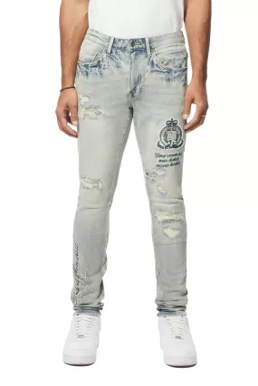 Preppy Crest Embroidered Slim Tapered Denim Jeans - Cascade Blue